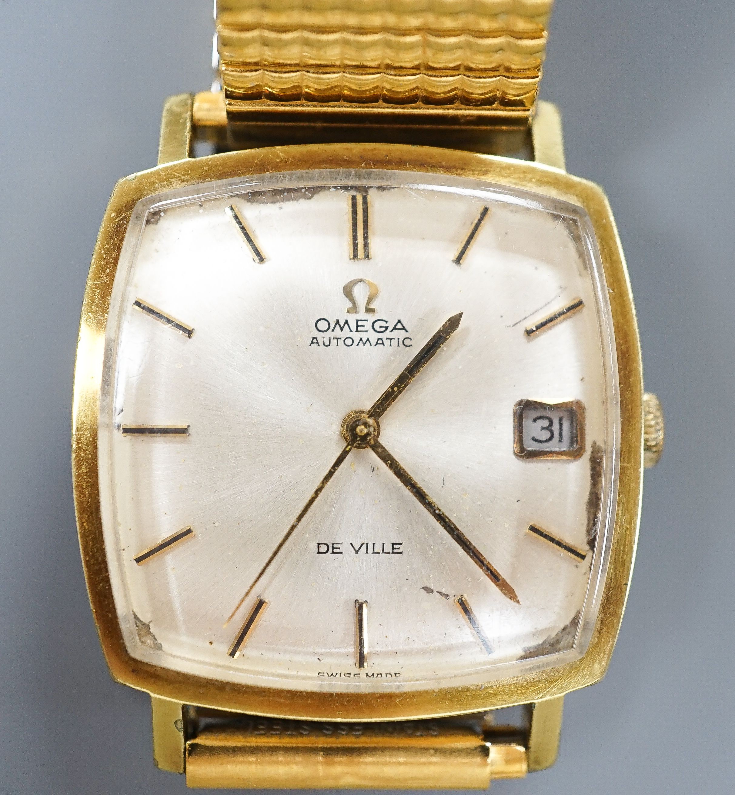 A gentleman's steel and gold plated Omega De Ville automatic wrist watch, on associated flexible strap, case diameter 32mm, no box or papers.